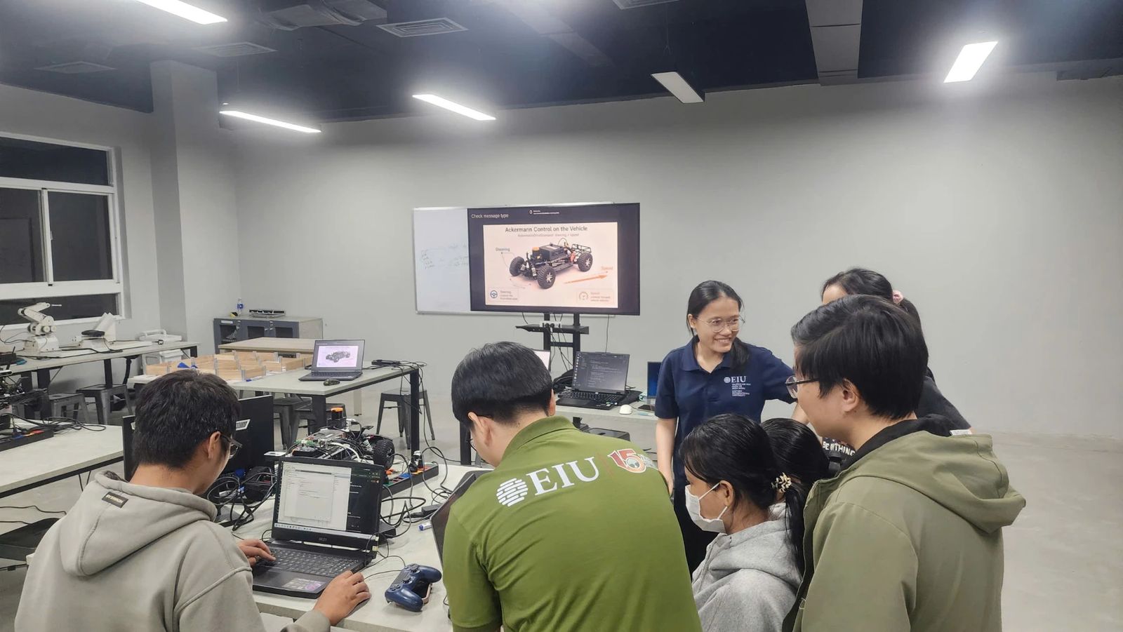 Students working with the F1TENTH car during a session